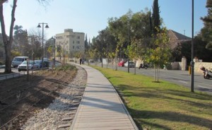 The old rail road track, which is now adjacent  to a paved walking / running / biking path