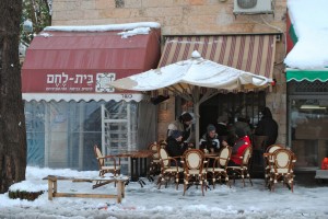 Snow, sleet, rain... Israelis still need their coffee.